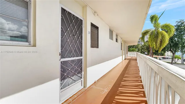 a view of a street with cars