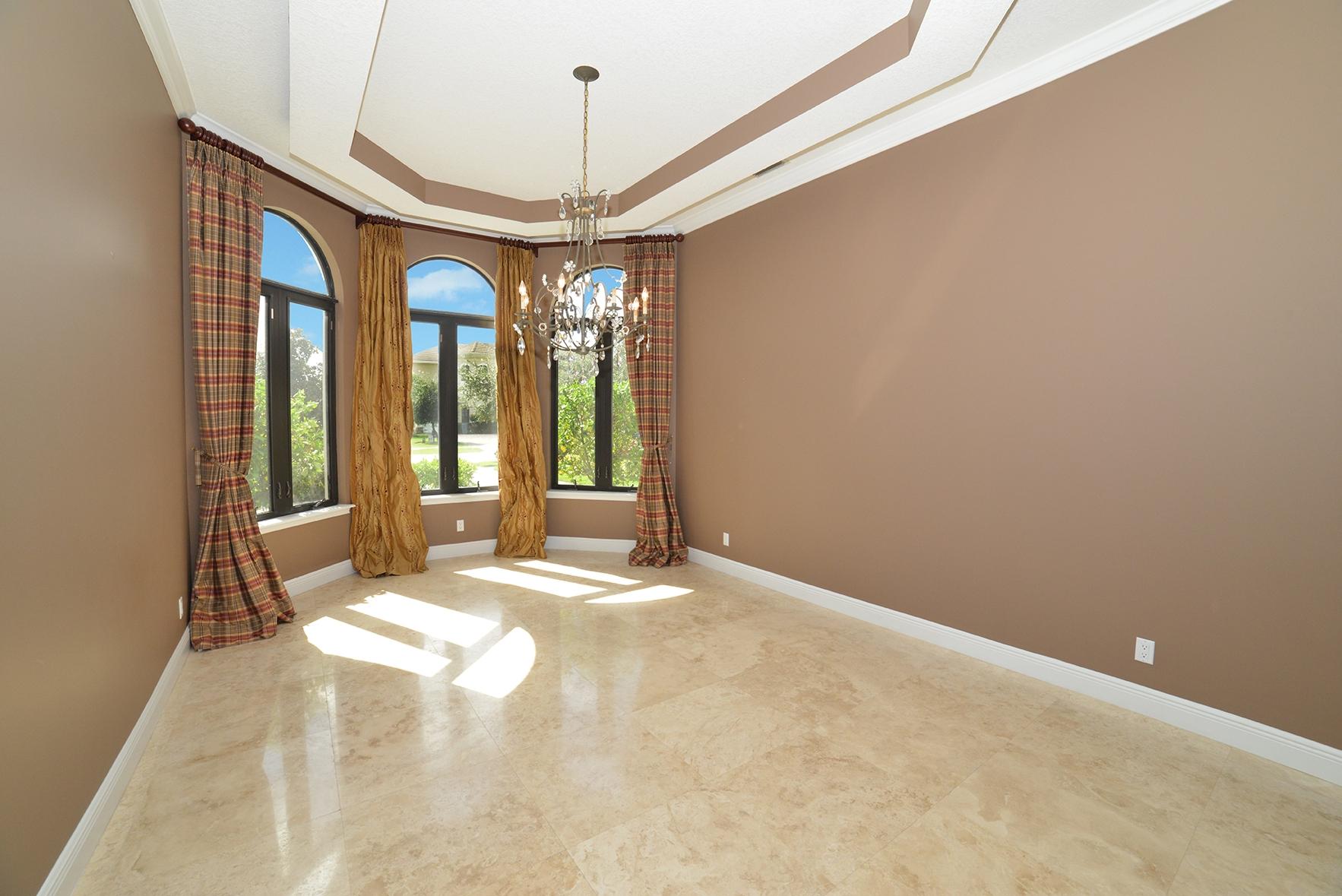9812 Equus Circle Boynton Beach, FL 33472 - Photo 13 of 39 a view of an empty room with a window