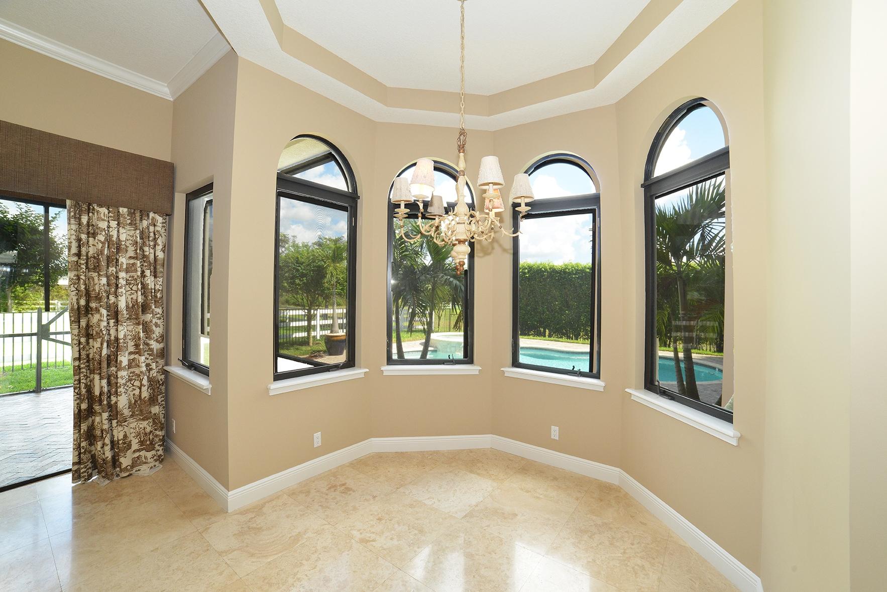 9812 Equus Circle Boynton Beach, FL 33472 - Photo 20 of 39 a view of a livingroom with furniture and window