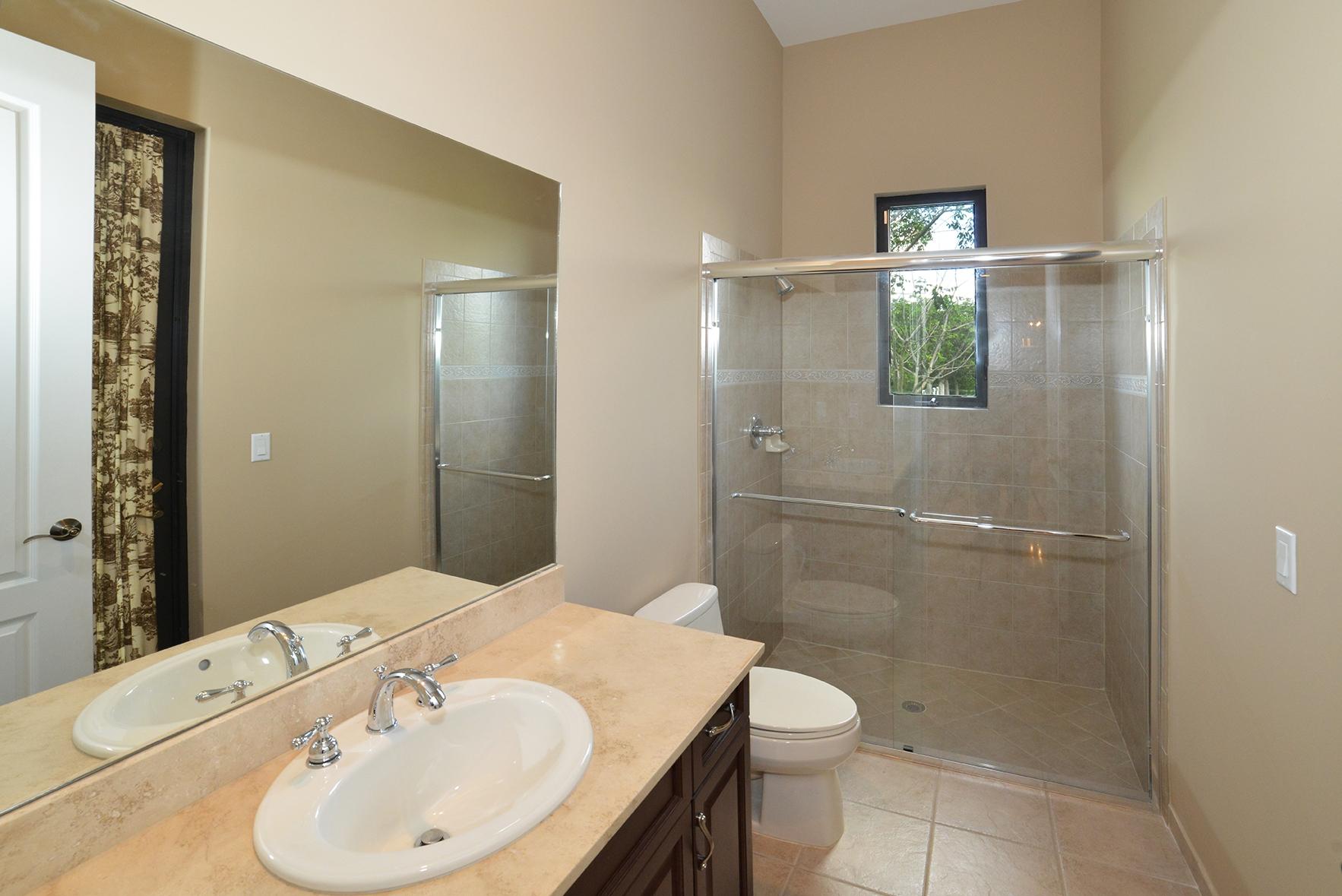 9812 Equus Circle Boynton Beach, FL 33472 - Photo 21 of 39 a bathroom with a sink toilet and shower