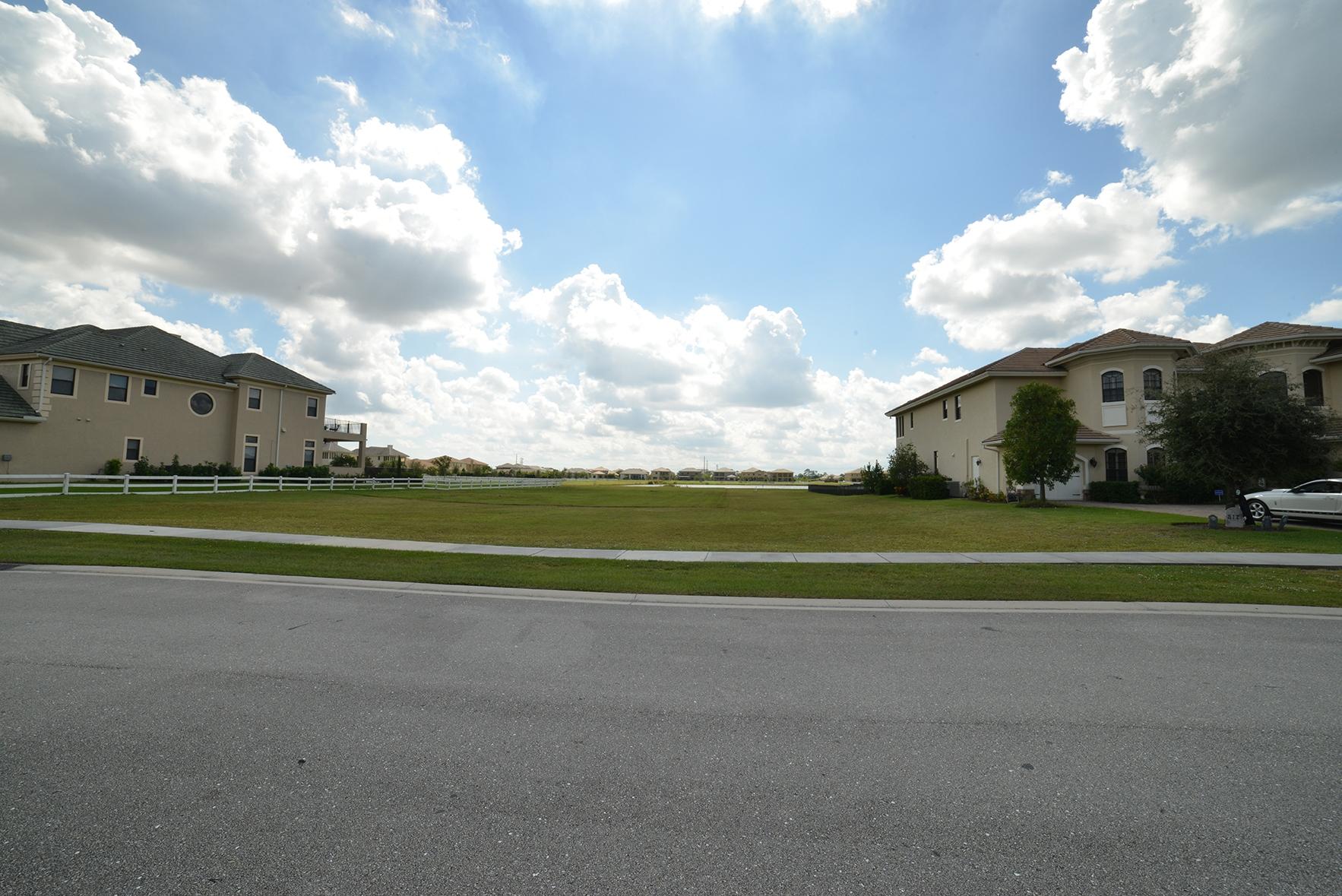 9812 Equus Circle Boynton Beach, FL 33472 - Photo 8 of 39 a view of building with outdoor space