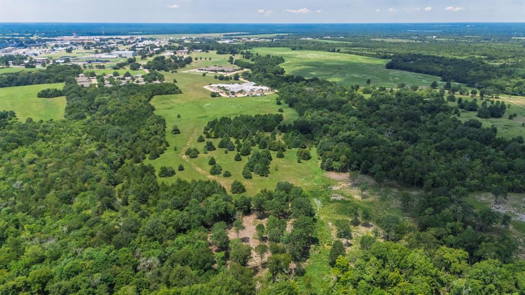83-ac Stillhouse Road Paris, TX 75462 - Photo 11 of 22 a view of a green field with an ocean view
