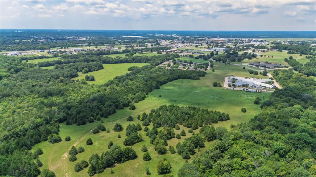 83-ac Stillhouse Road Paris, TX 75462 - Photo 15 of 22 an aerial view of multiple house