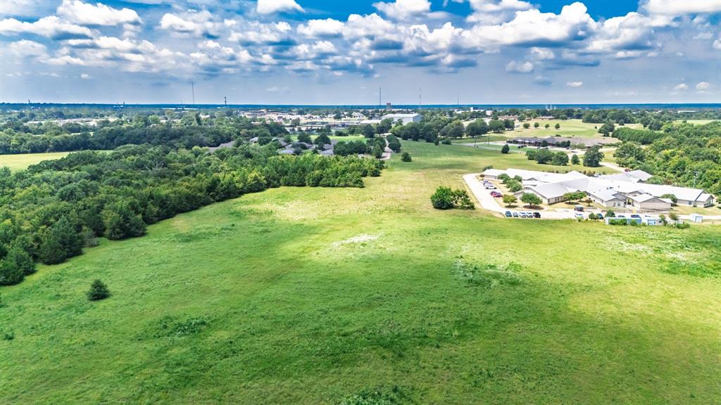83-ac Stillhouse Road Paris, TX 75462 - Photo 18 of 22 a view of a lake in front of a building