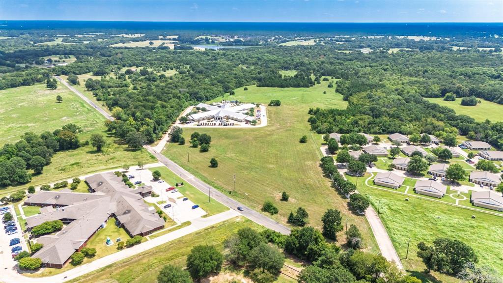 83-ac Stillhouse Road Paris, TX 75462 - Photo 4 of 22 an aerial view of residential houses with outdoor space