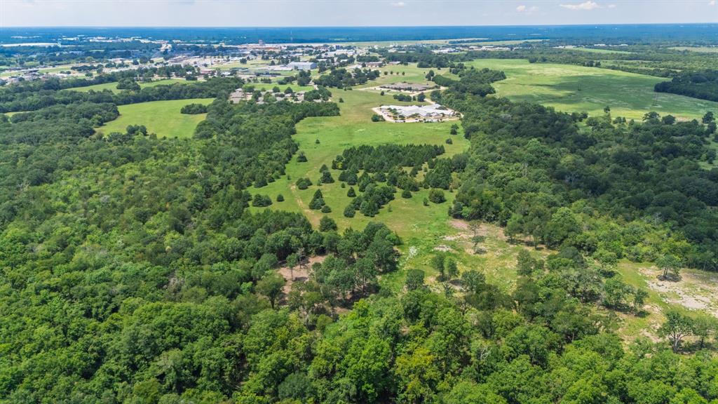 83-ac Stillhouse Road Paris, TX 75462 - Photo 10 of 22 a view of a lake with huge green field and mountain view