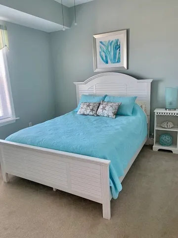 a view of chair and table in wooden floor