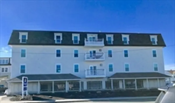 a front view of a building with street