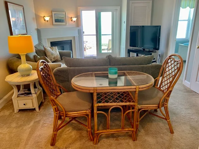 a kitchen with a cabinets and white appliances