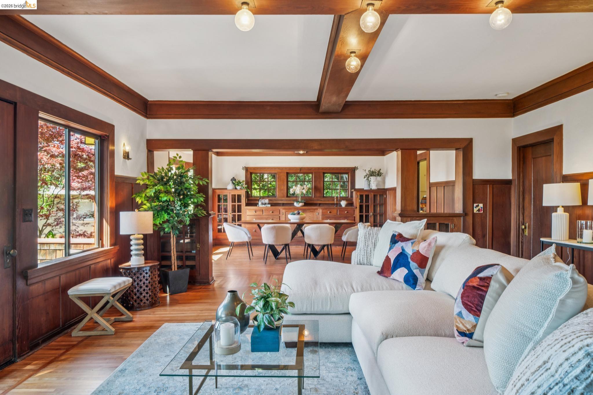 813 San Diego Road Berkeley, CA 94707 - Photo 13 of 60 a living room with furniture and a large window