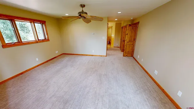 a view of an empty walk in closet