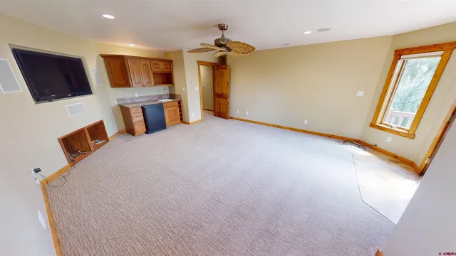 a view of a livingroom with a flat screen tv