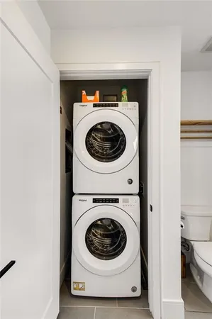 a utility room with dryer and washer