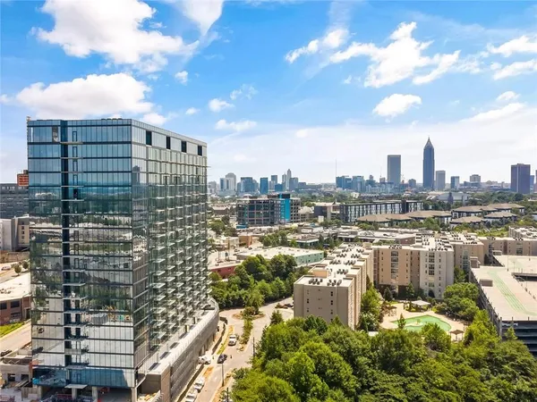 a view of a city with tall buildings
