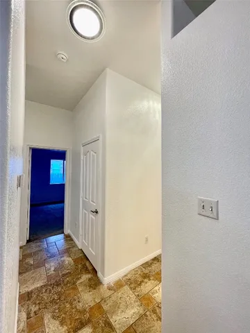 a bathroom with a toilet a bath tub and a shower