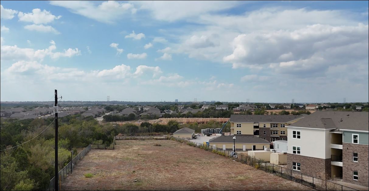 11114 Cameron Road Austin, TX 78754 - Photo 4 of 12 Aerial perspective of suburban area