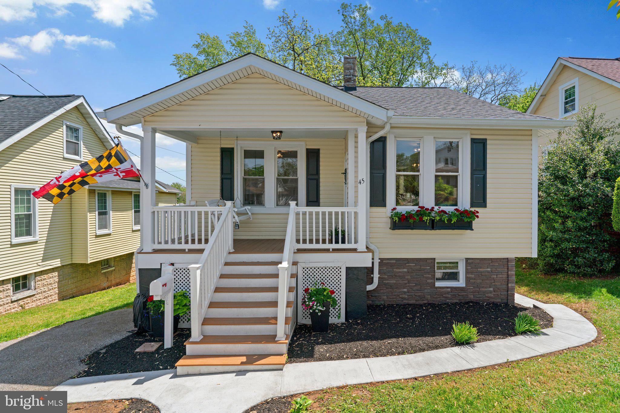 45 Edmondson Ridge Road Baltimore, MD 21228 - Photo 1 of 44 a front view of a house with a yard