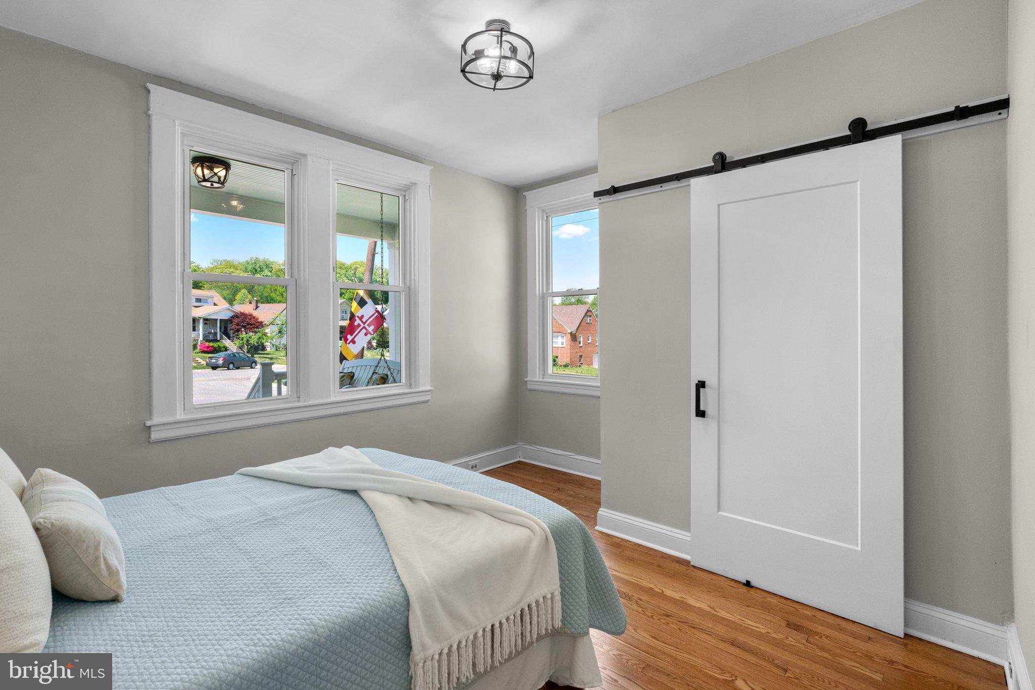 45 Edmondson Ridge Road Baltimore, MD 21228 - Photo 12 of 44 a bedroom with a bed and a window