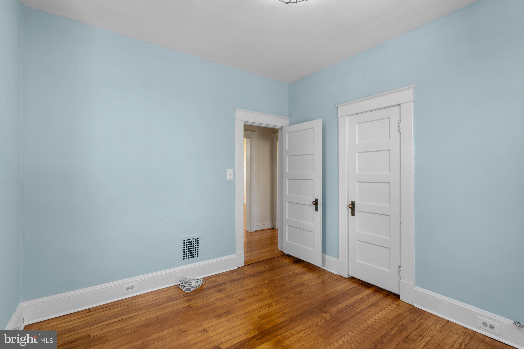 45 Edmondson Ridge Road Baltimore, MD 21228 - Photo 15 of 44 a view of an empty room and wooden floor