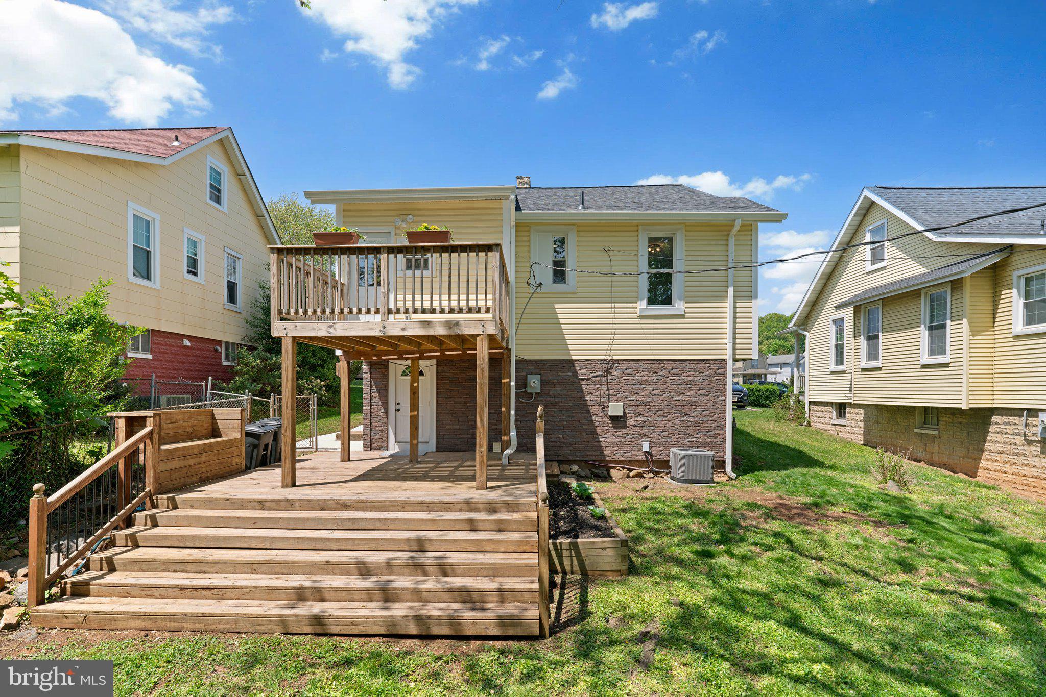 45 Edmondson Ridge Road Baltimore, MD 21228 - Photo 25 of 44 a view of a house with a small yard and plants