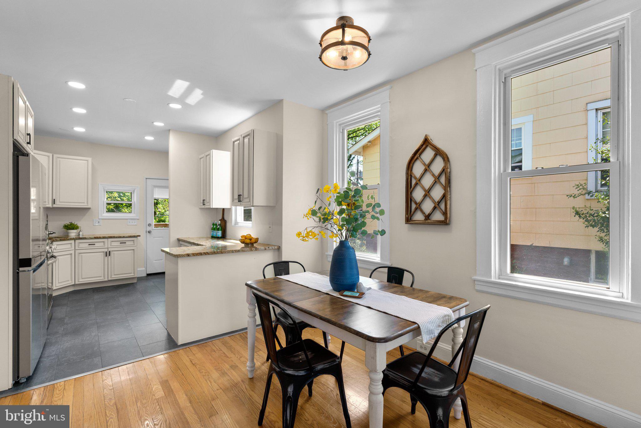 45 Edmondson Ridge Road Baltimore, MD 21228 - Photo 7 of 44 a kitchen with a table and chairs in it
