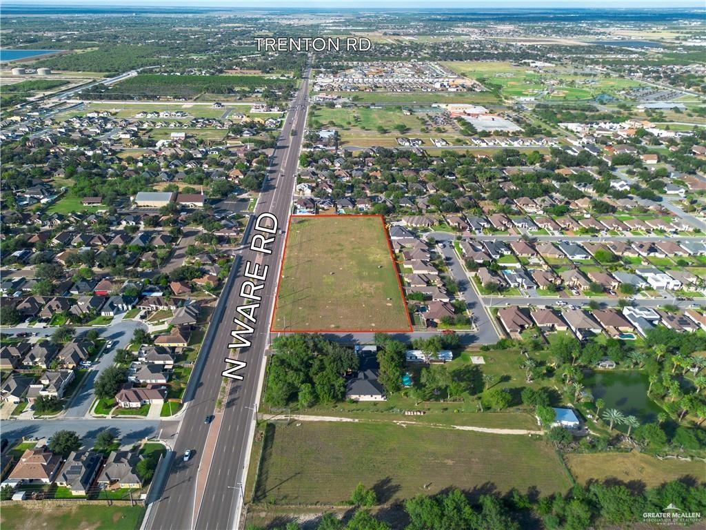 7300 North Ware Road McAllen, TX 78504 - Photo 3 of 6 an aerial view of residential building with outdoor space and trees