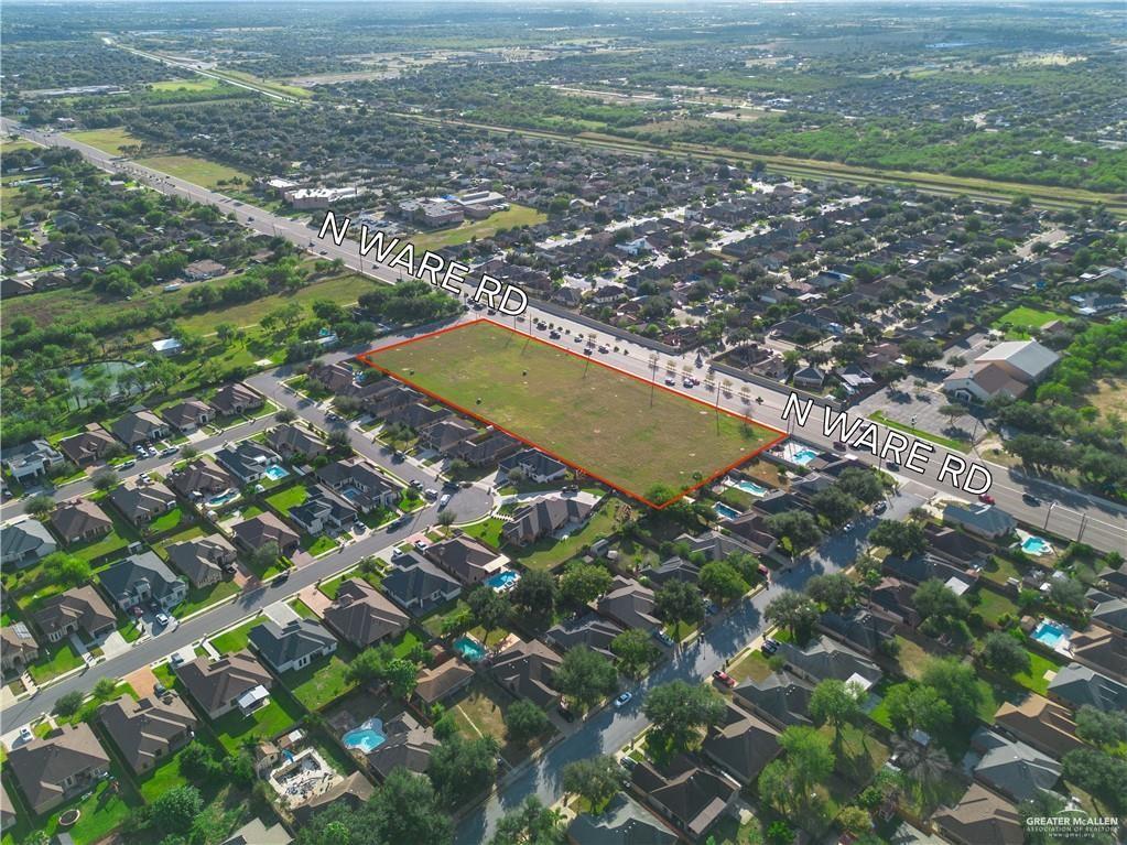 7300 North Ware Road McAllen, TX 78504 - Photo 5 of 6 an aerial view of residential houses with outdoor space
