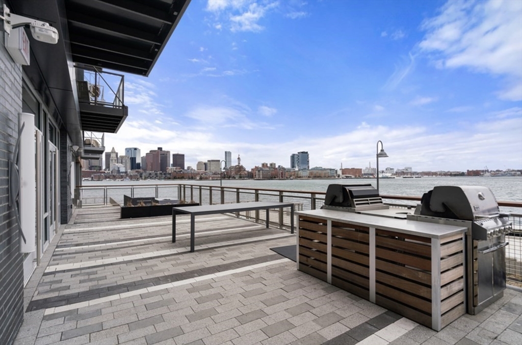 45 Lewis Street, Unit 210 Boston, MA 02128 - Photo 21 of 27 a view of a terrace with sitting area