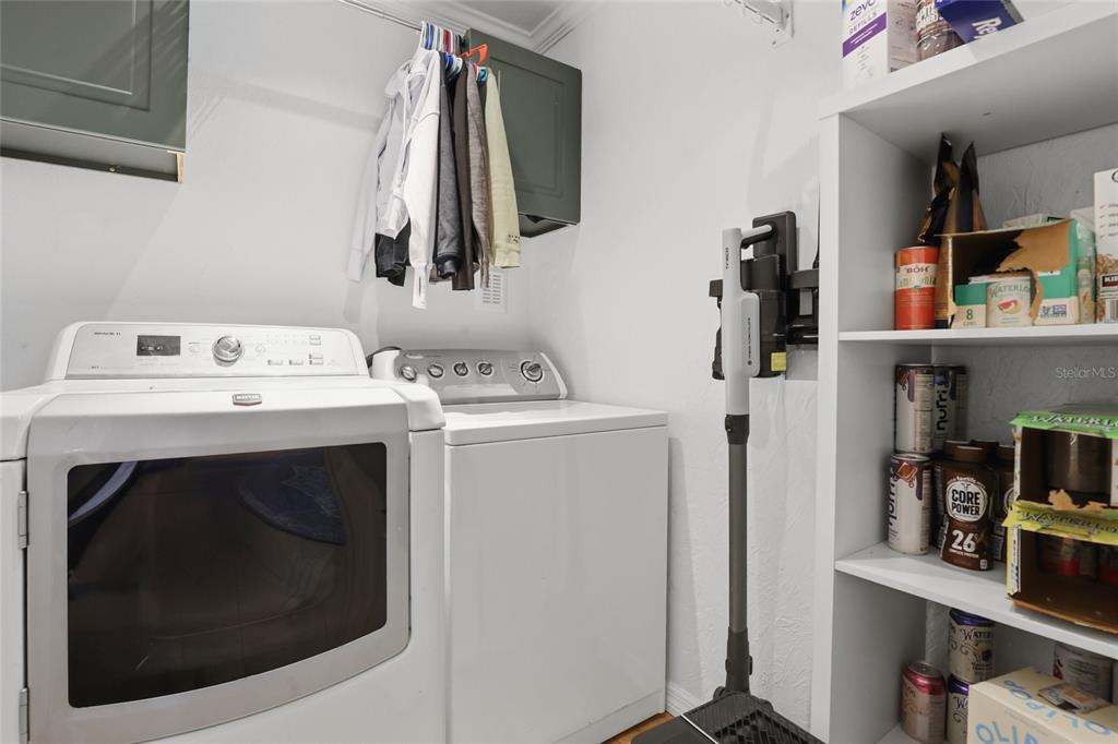 4576 Bliss Road Sarasota, FL 34233 - Photo 27 of 40 a utility room with dryer and washer