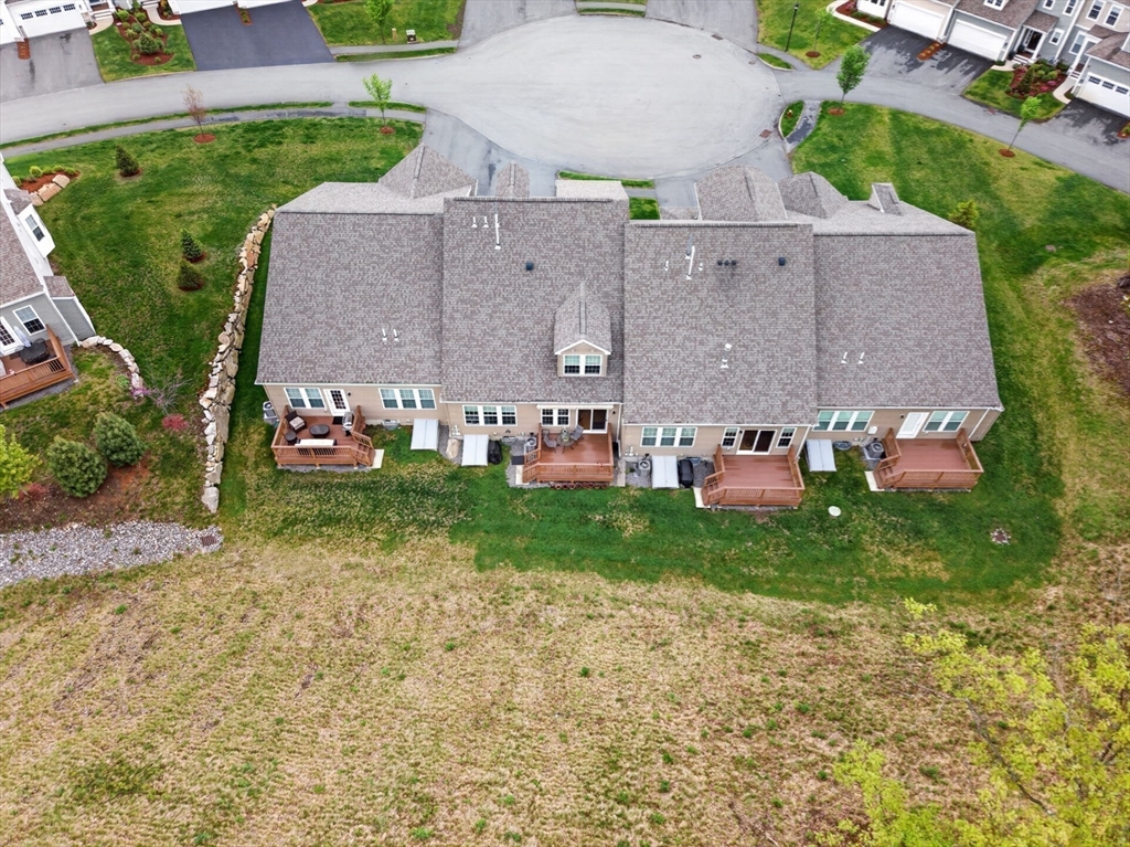 87 Shannon Way, Unit 86 Upton, MA 01568 - Photo 32 of 36 an aerial view of a house with garden