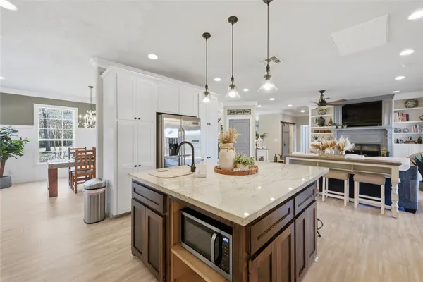 a kitchen with a stove and a sink