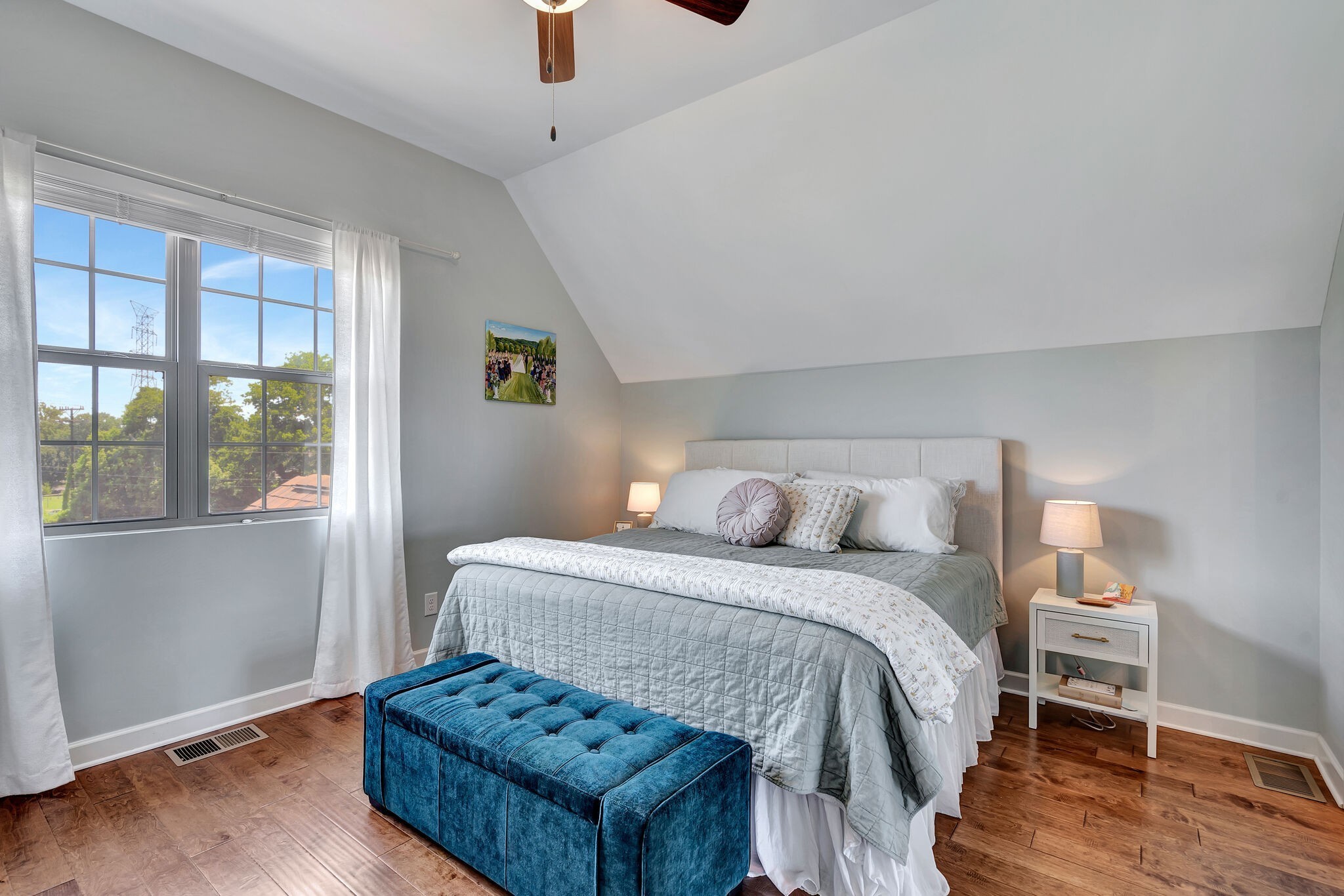 712 Bellevue Road Nashville, TN 37221 - Photo 15 of 31 a bedroom with a bed and wooden floor