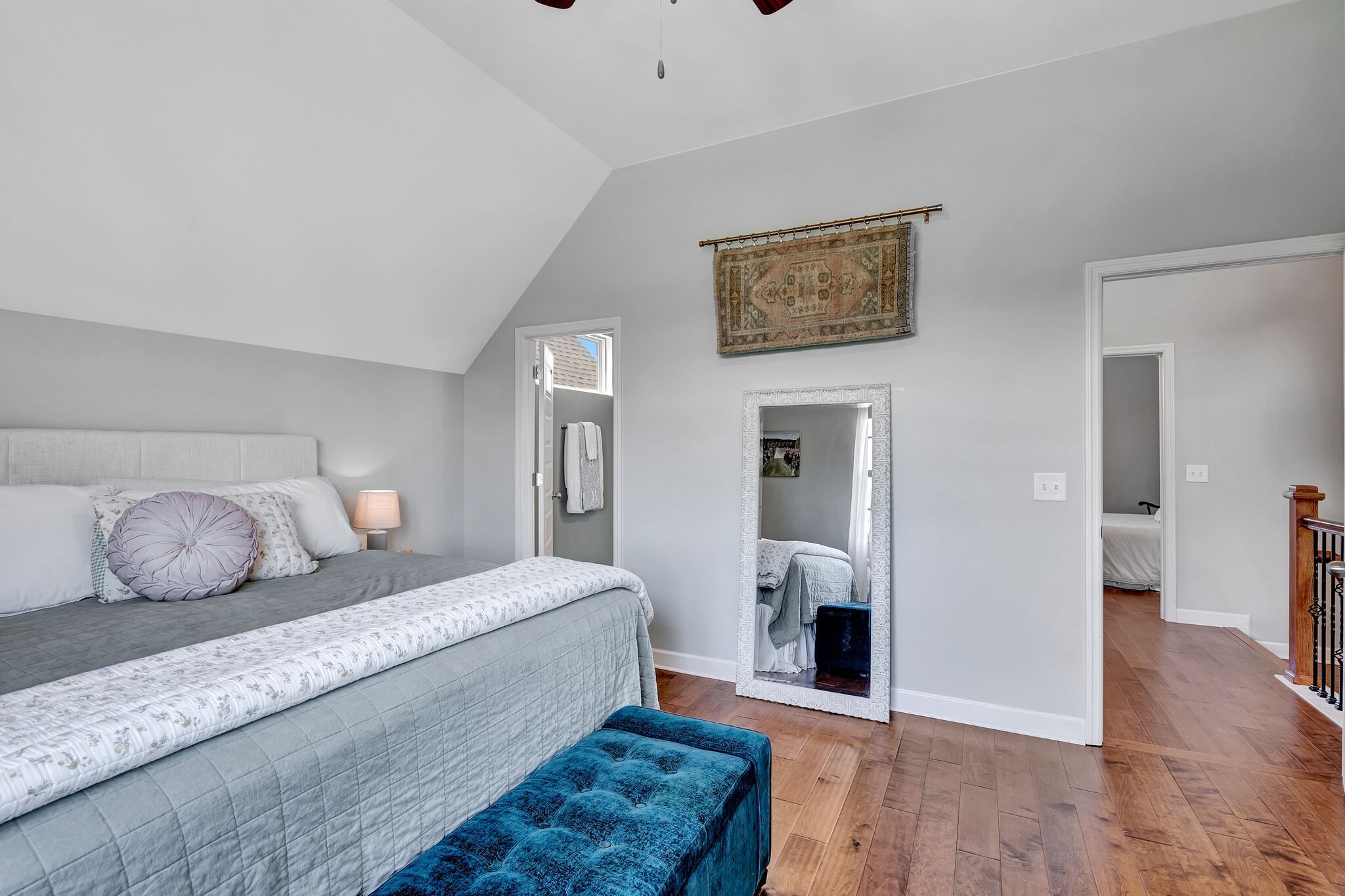 712 Bellevue Road Nashville, TN 37221 - Photo 17 of 31 a bedroom with a bed and wooden floor