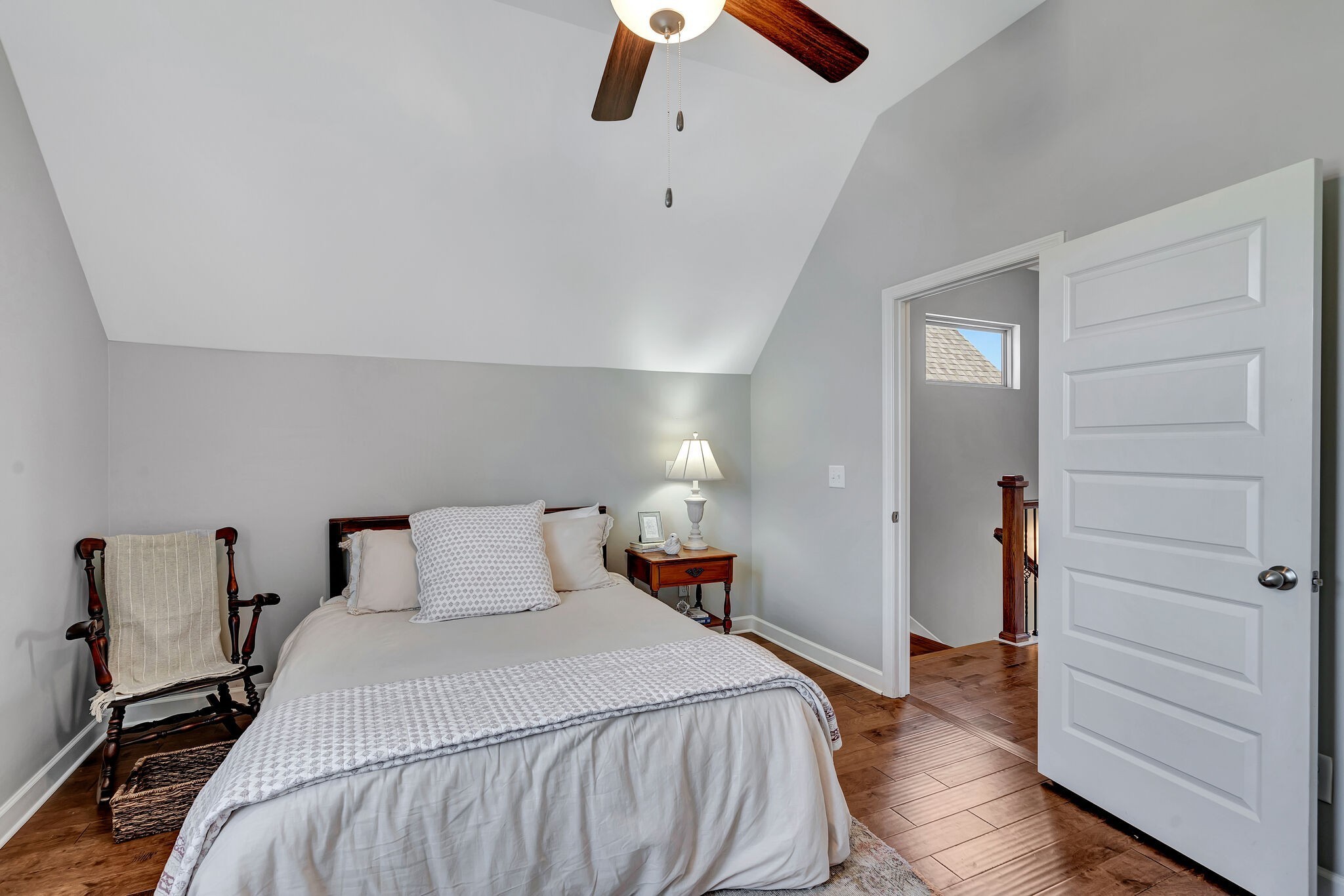 712 Bellevue Road Nashville, TN 37221 - Photo 21 of 31 a bedroom with a bed and wooden floor