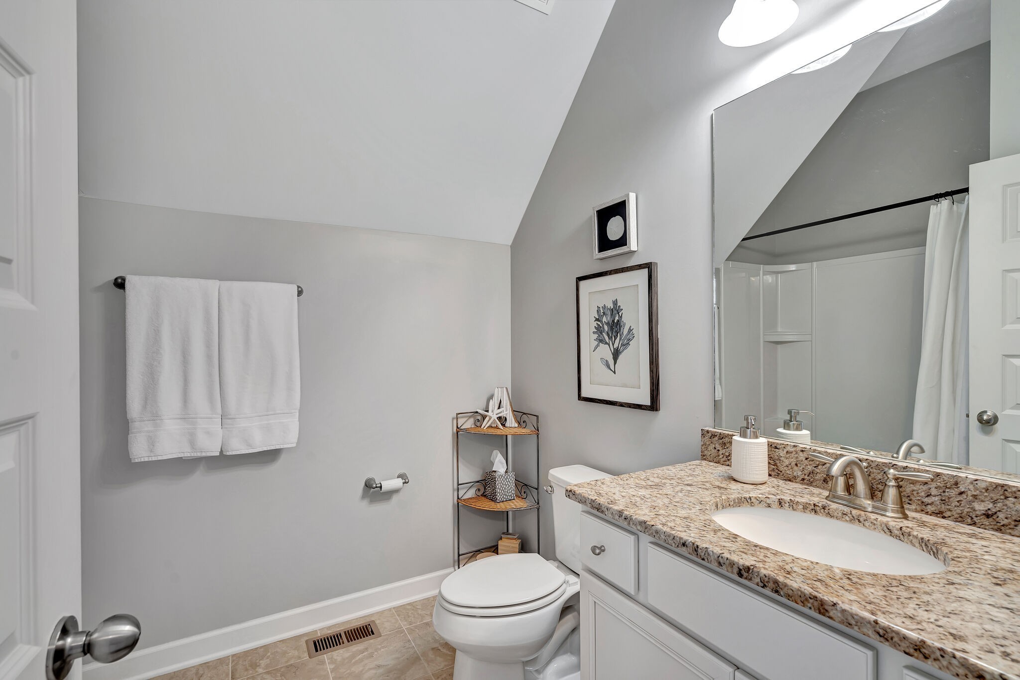 712 Bellevue Road Nashville, TN 37221 - Photo 22 of 31 a bathroom with a granite countertop sink a toilet and a mirror