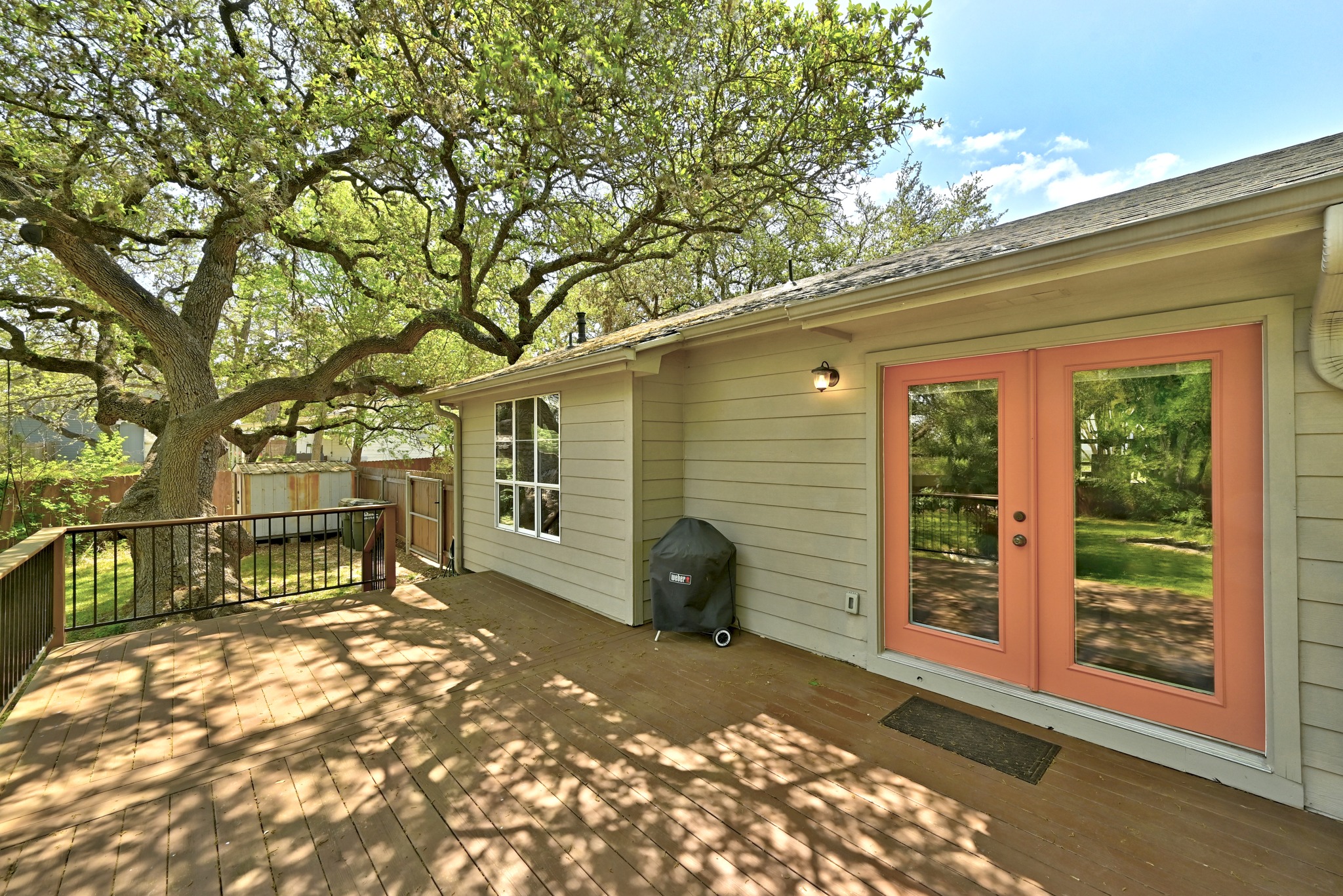 2207 Balboa Road Austin, TX 78733 - Photo 24 of 34 The backyard features an expansive deck!