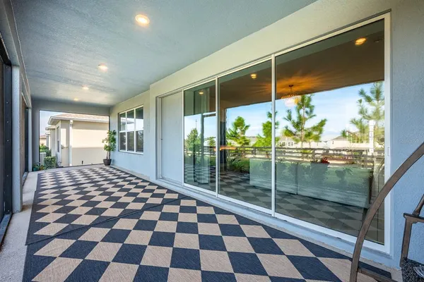 a room with a black white checkered floor