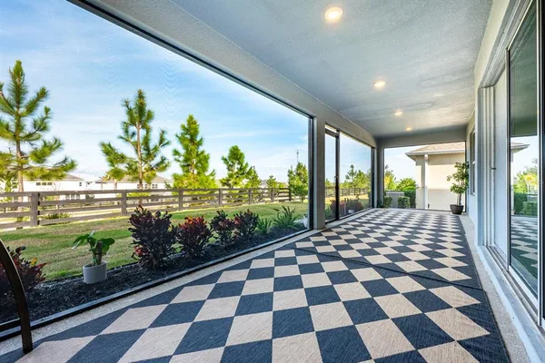a view of a bunch of flowers in a balcony