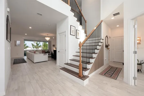 a view of an entryway with staircase