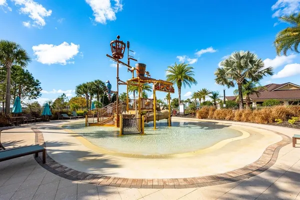 a view of a swimming pool with a patio