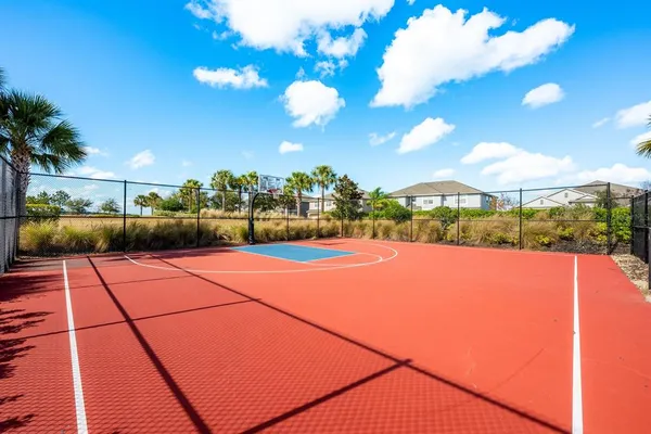 a view of an outdoor space with pool and furniture