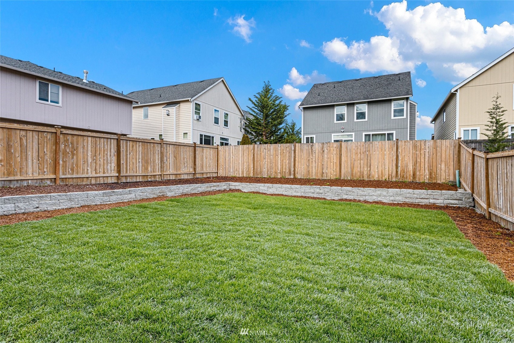 254 Whitman Place Northeast Renton, WA 98059 - Photo 31 of 32 a view of yard with a big yard and wooden fence