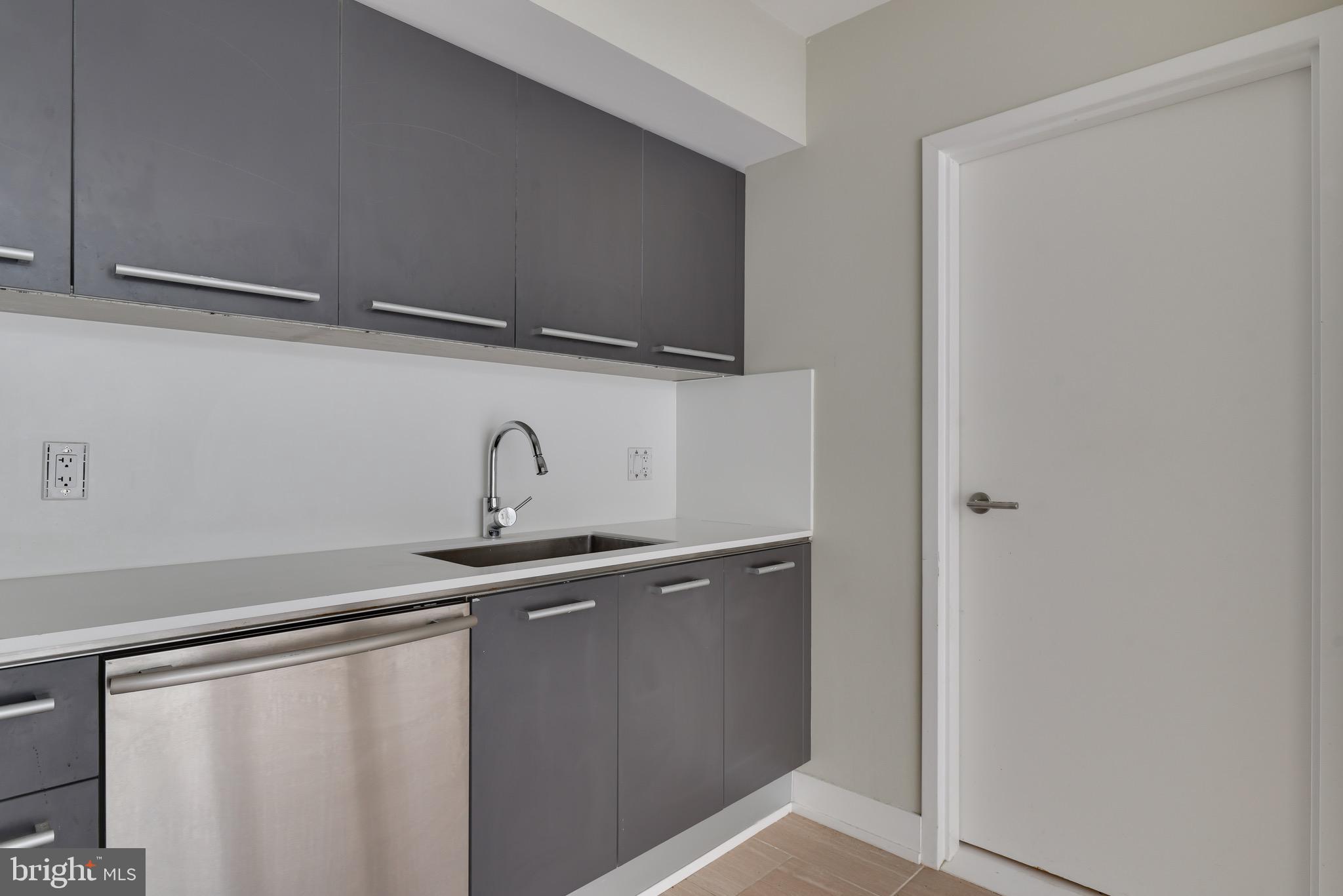 2250 11th Street Northwest, Unit 108 Washington, DC 20001 - Photo 14 of 26 a close view of a sink and tap