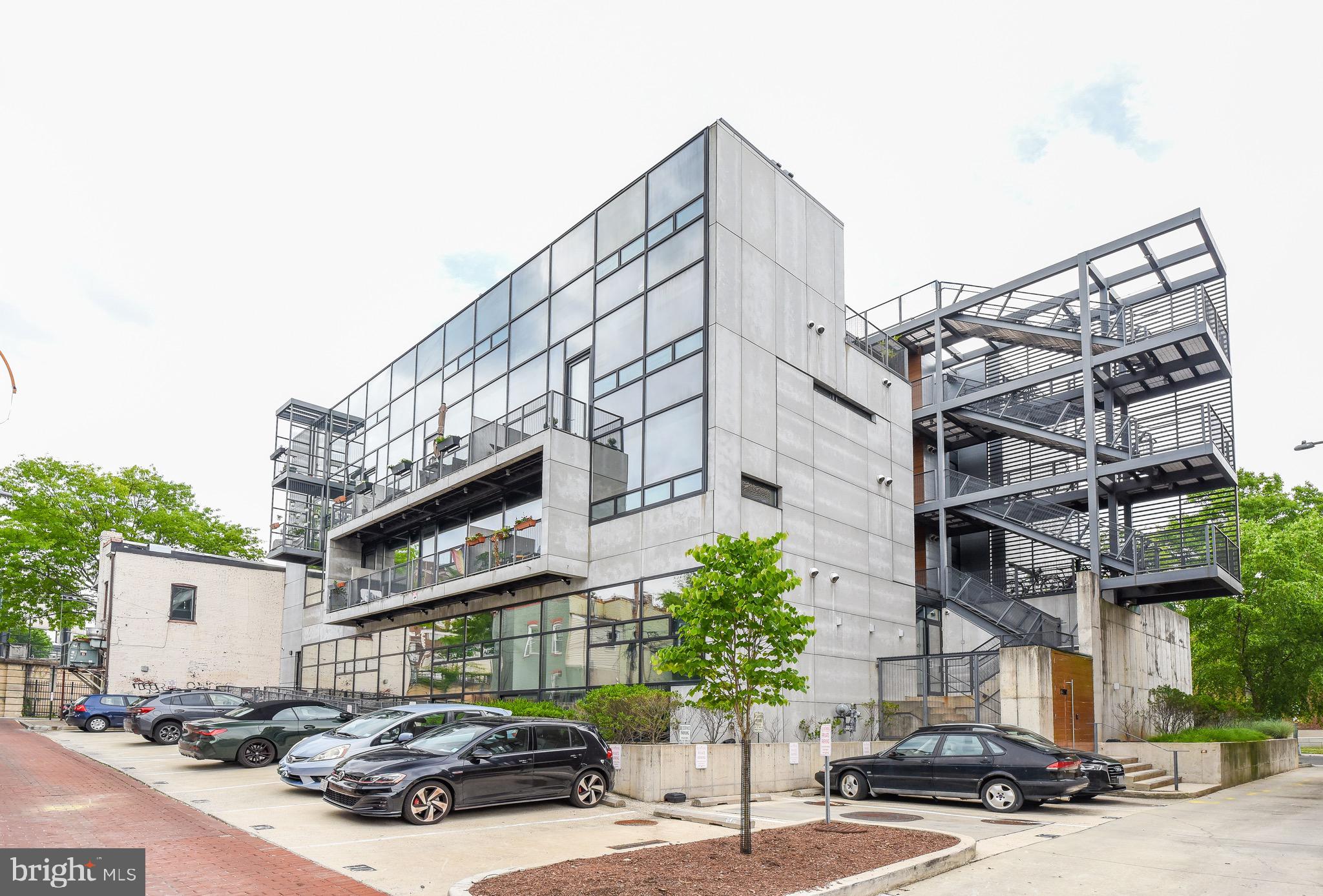 2250 11th Street Northwest, Unit 108 Washington, DC 20001 - Photo 24 of 26 a car parked in front of a building