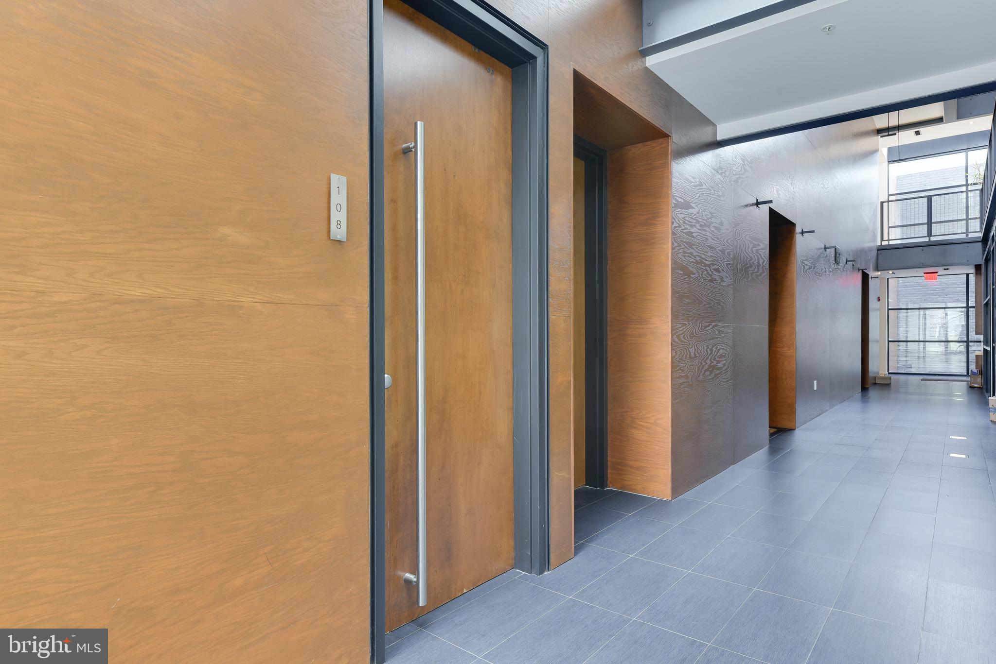 2250 11th Street Northwest, Unit 108 Washington, DC 20001 - Photo 5 of 26 a view of hallway with livingroom