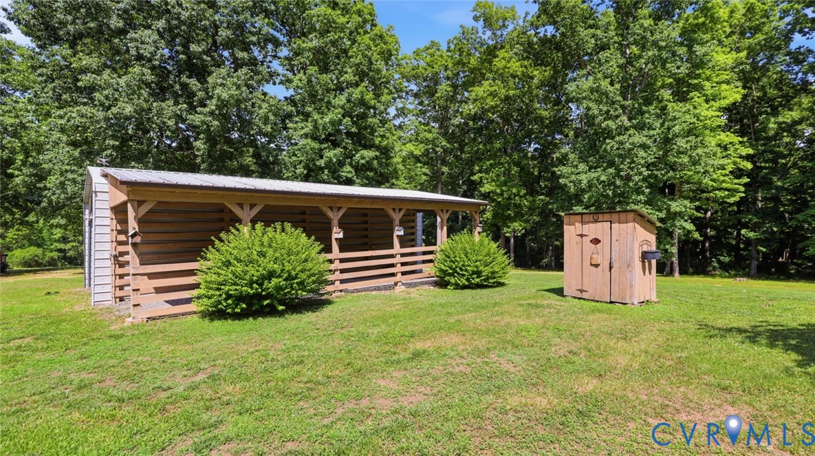 1611 Otterdale Road Midlothian, VA 23114 - Photo 36 of 52 Metal carport w/ lean-to