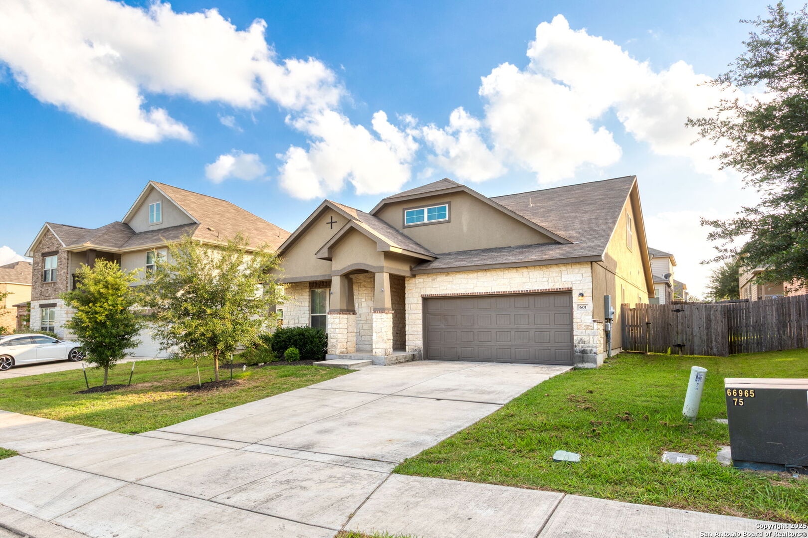 601 Saddle Villa Cibolo, TX 78108 - Photo 2 of 15 a front view of a house with garden