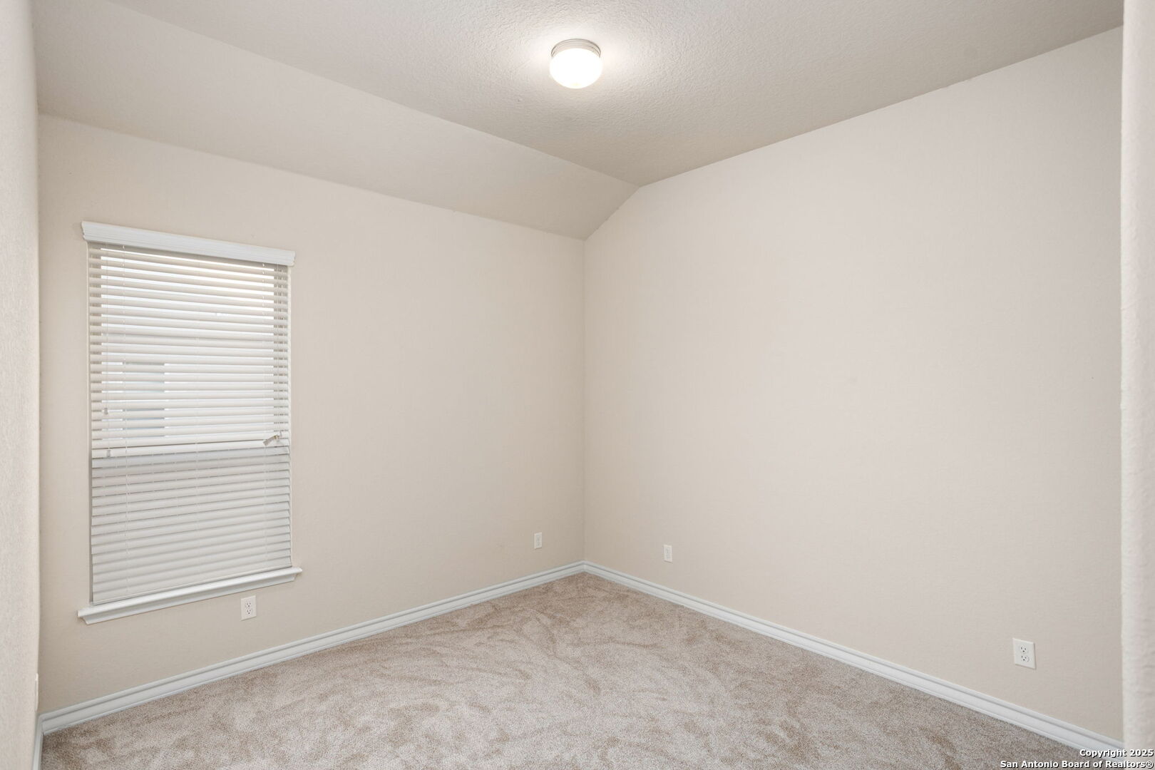 601 Saddle Villa Cibolo, TX 78108 - Photo 5 of 15 an empty room with a window