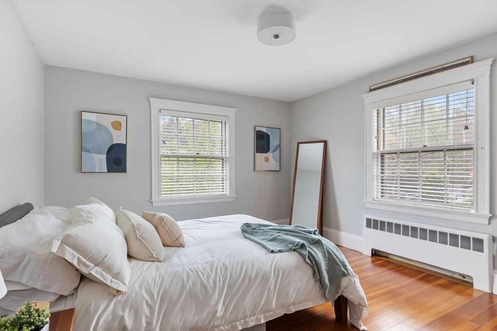 311 Clark Road Brookline, MA 02445 - Photo 13 of 26 a bedroom with a bed and a window