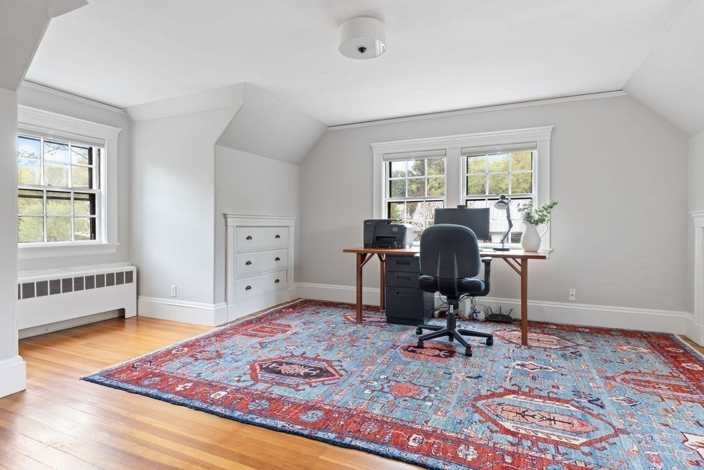 311 Clark Road Brookline, MA 02445 - Photo 16 of 26 a view of a workspace with furniture and a window